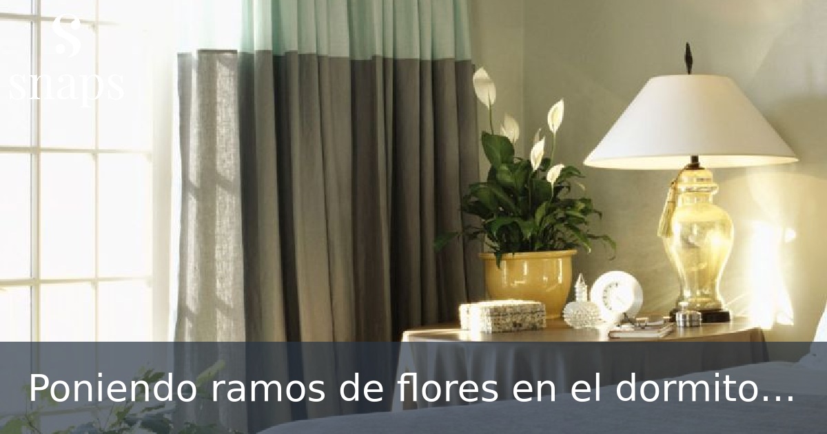 Poniendo ramos de flores en el dormitorio