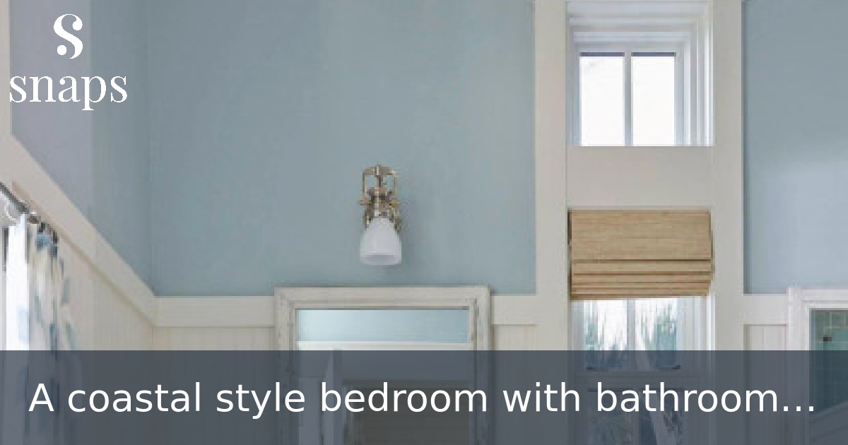 A coastal style bedroom with bathroom inside